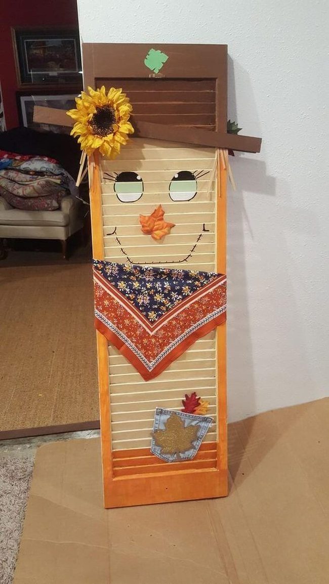 Cheerful Shutter Scarecrow Art