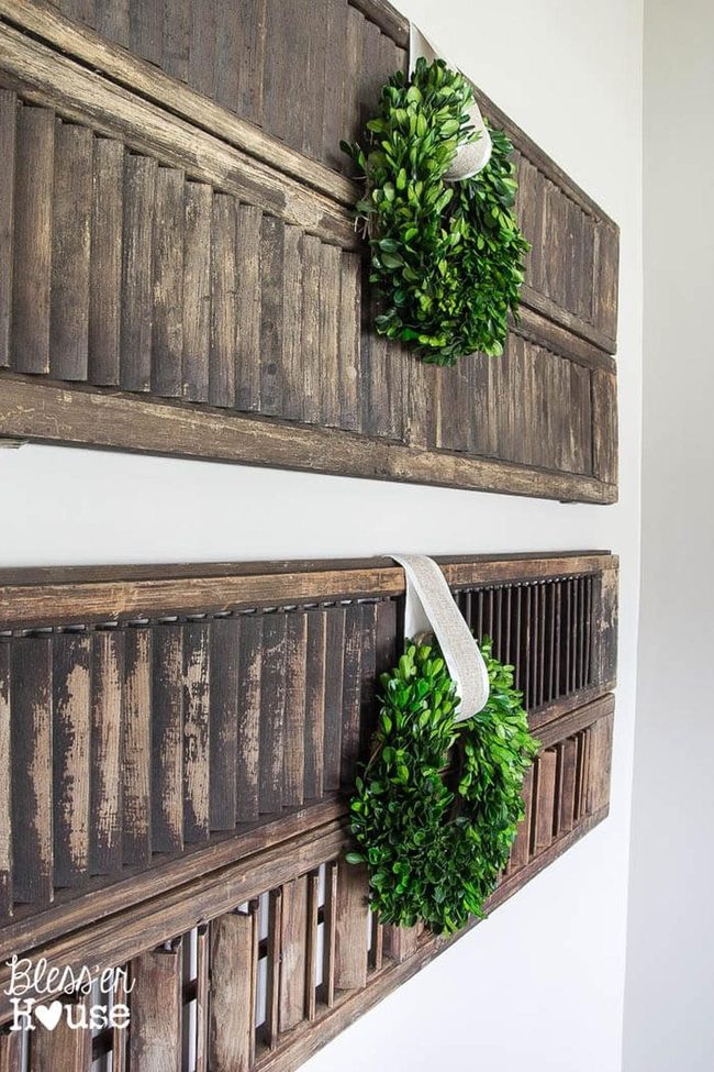 White Ribboned Wreaths On Wood Slats