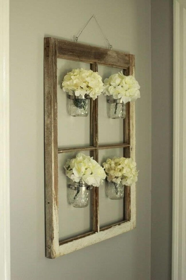White Flowers In Glass Jars