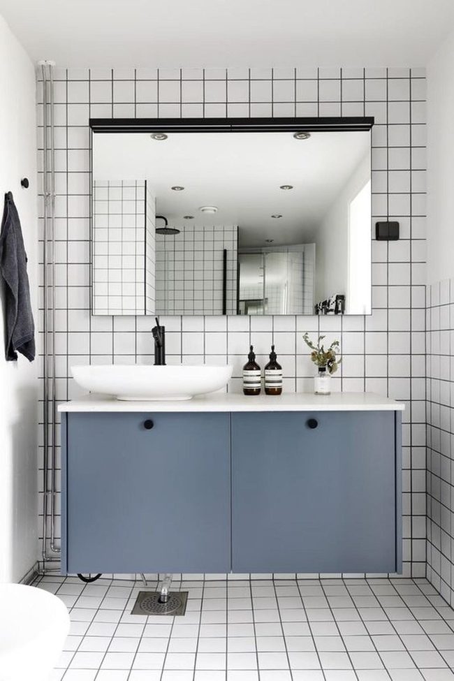 White Tiles, Blue Cabinet Accents