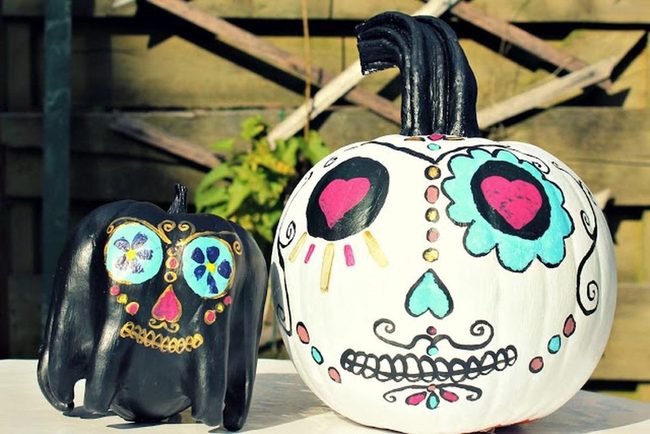 Black Pumpkins With Painted Faces