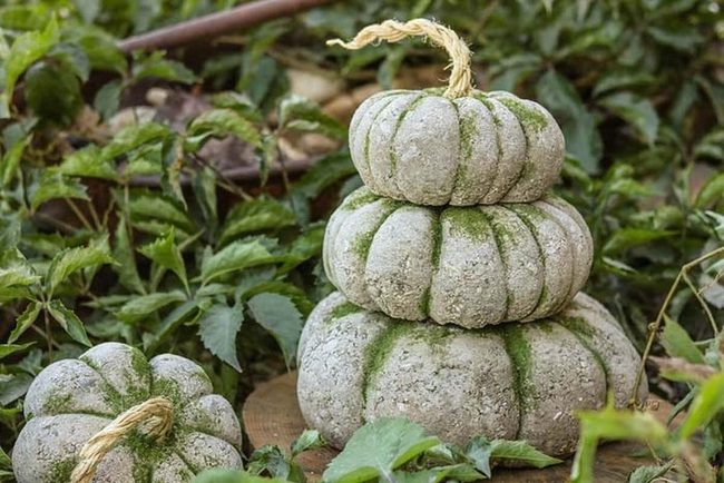 Moss-Covered Concrete Pumpkins