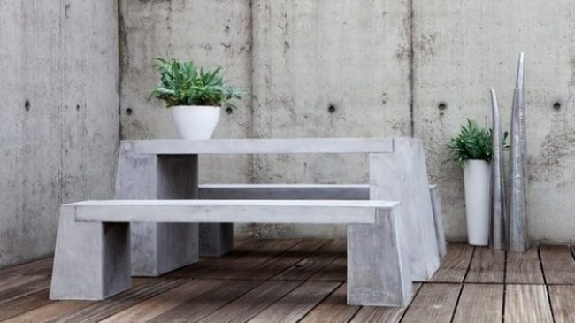 Concrete Table With Sunlit Greens