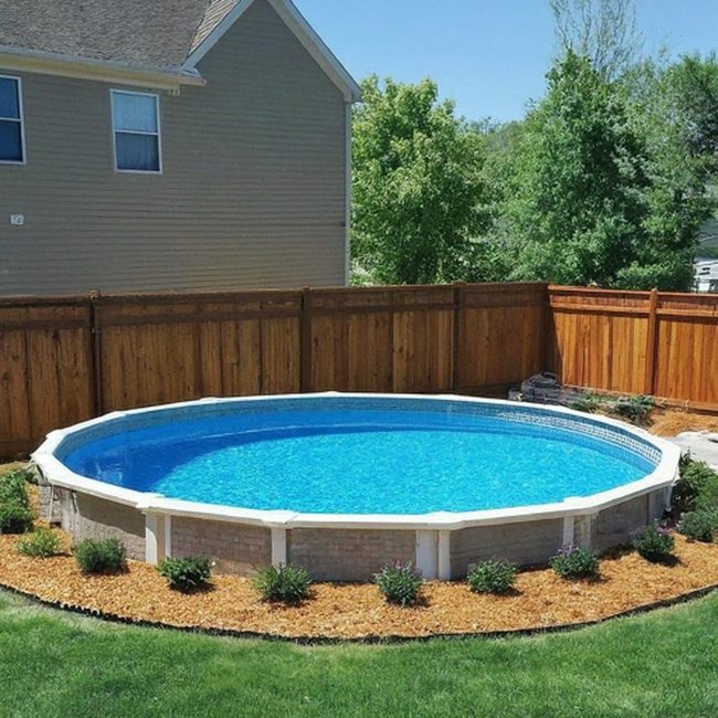 Stone Pavers Define Pool Borders