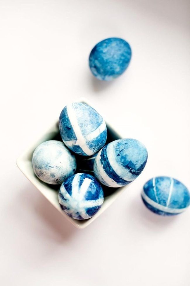 Blue Speckled Eggs In White Bowl