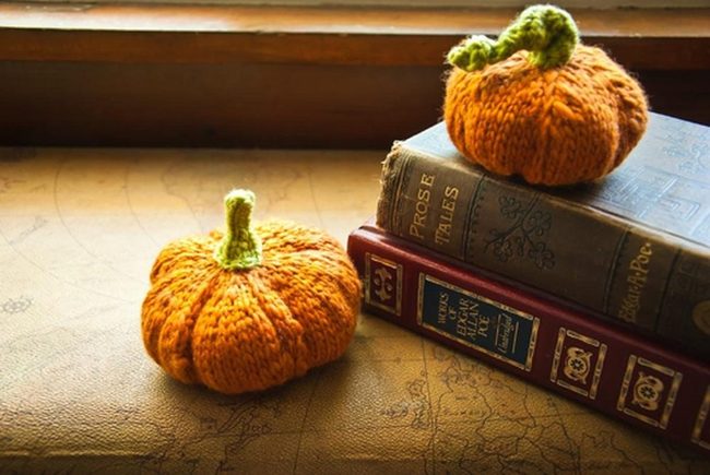 Orange Knit Pumpkins On Vintage Books