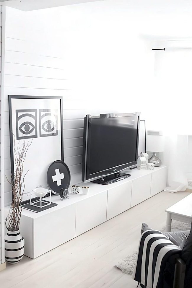 Dark Striped Sofa Meets White Minimalism