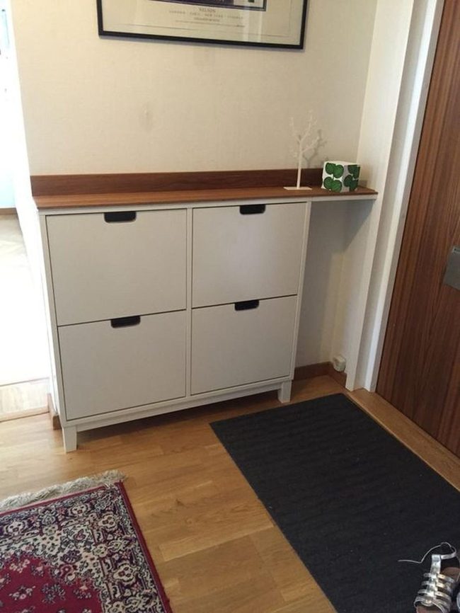 White Storage With Warm Wood Accents