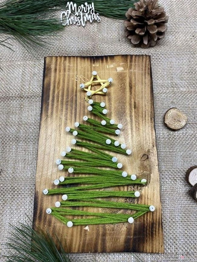 Green Yarn Tree On Wood