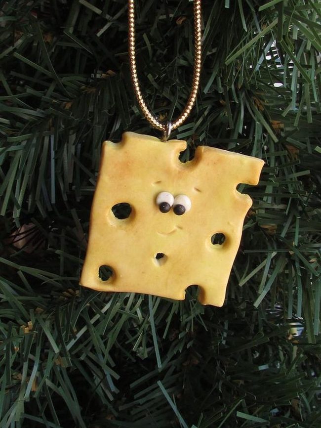 Golden Cheese Ornament With Eyes