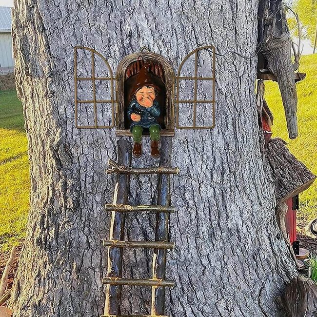 Grinning Elf In Backyard Tree