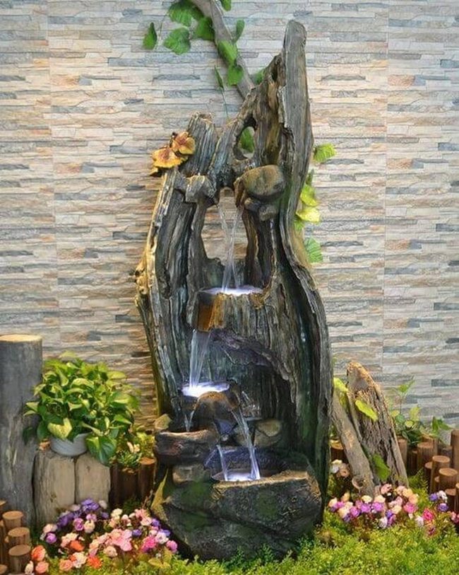 Stone Waterfall With Blue-Lit Cascade