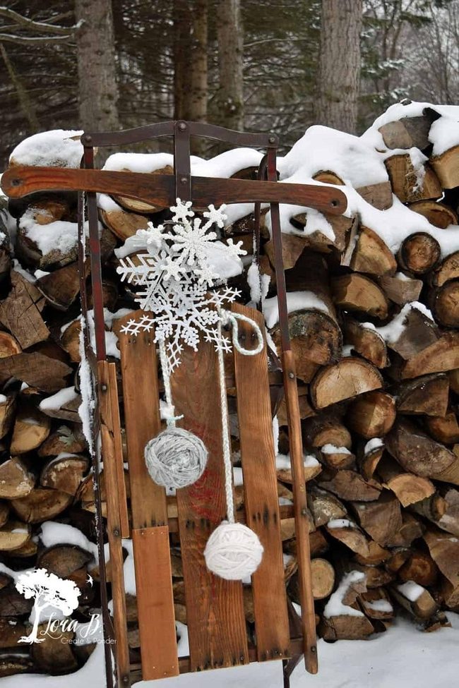 Wooden Sleds And Yarn Spheres
