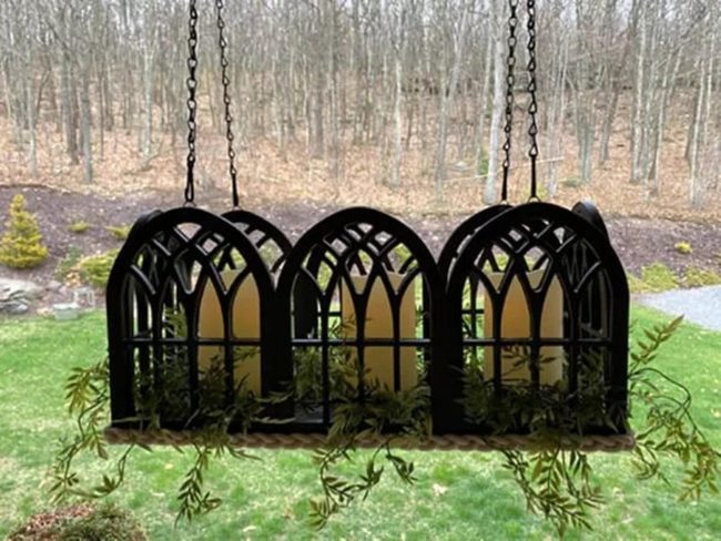 Arched Chandelier With Trailing Greenery