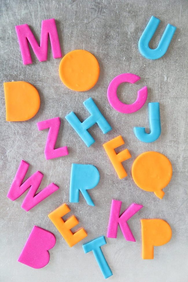 Colorful Letters On Gray Canvas