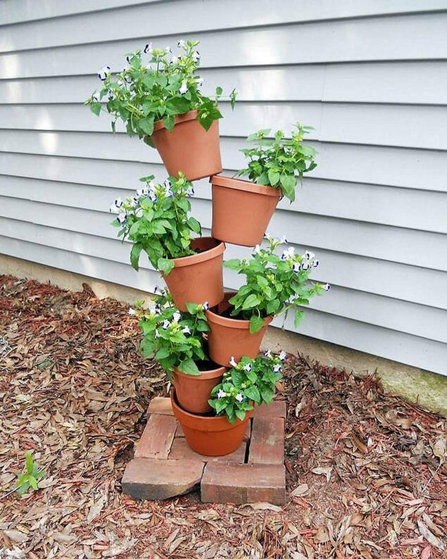Tilted Terracotta Flower Tower