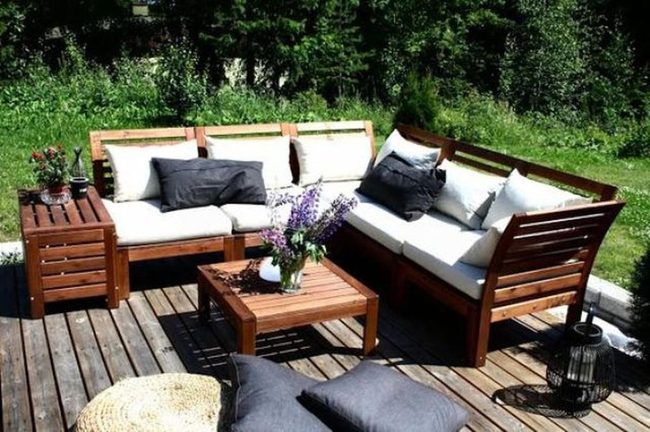 Natural Wood Deck With White Cushions
