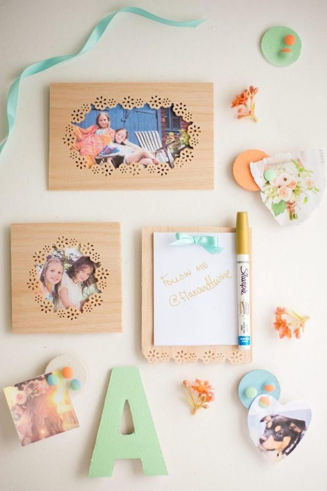 Green Textured Letter Among Wooden Frames
