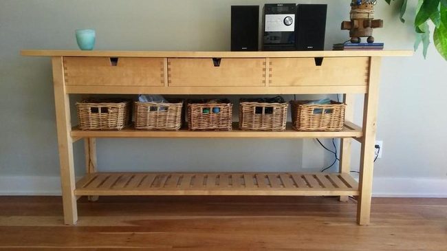 Wooden Table With Wicker Storage
