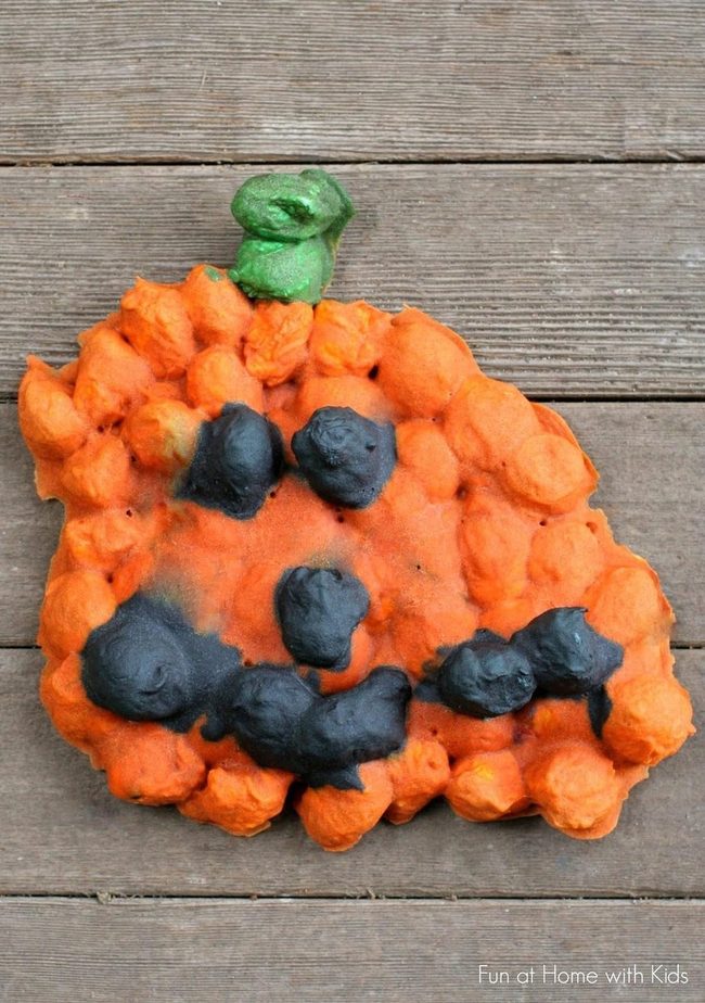 Orange Pumpkins On Wooden Base