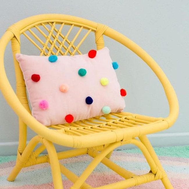 Yellow Rattan Chair Pom-Pom Paradise