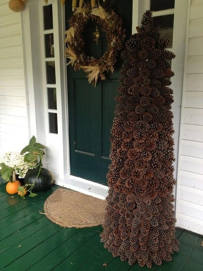 Dark Green Door With Pinecone Tower