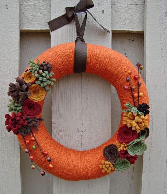 Orange Yarn Wreath With Felt Flowers