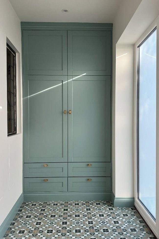 Teal Wardrobe With Geometric Mosaic Tiles