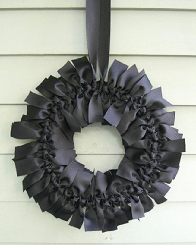 Black Ribbon Wreath Statement