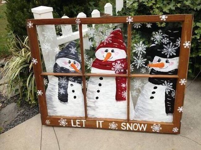 Painted Snowmen On Wooden Window