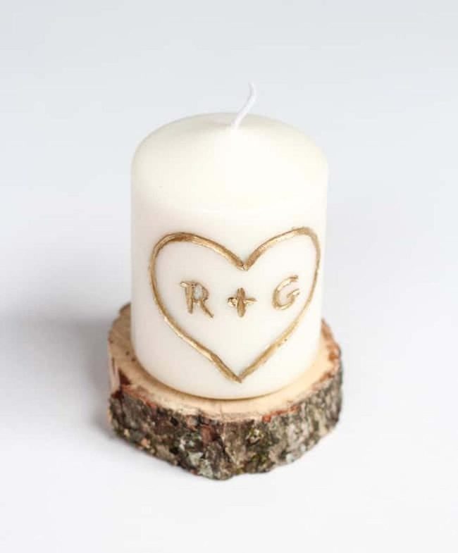 Gold Monogram Candle On Wood