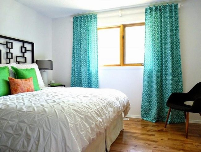 White Bedroom With Blue Window Curtains