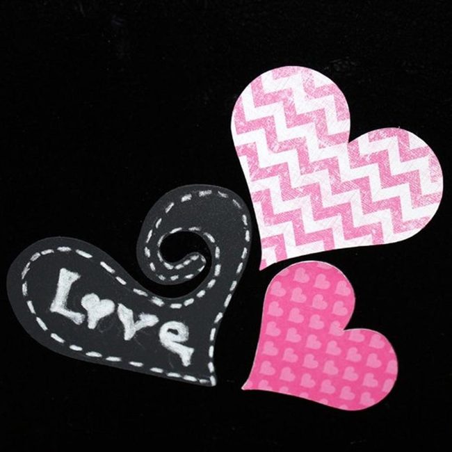 Pink Paper Hearts On Black
