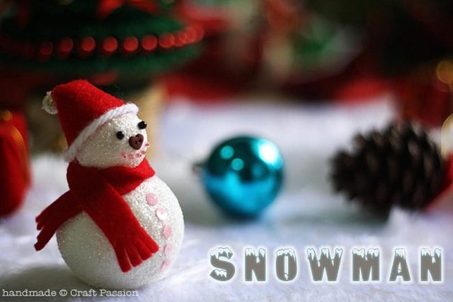 Red-Hatted Snowman With Pine Cone