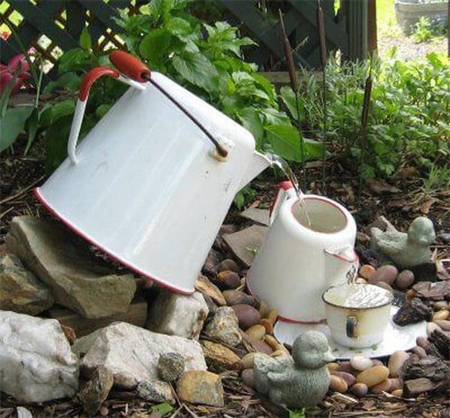 Ceramic Ducks Among Flowing Water