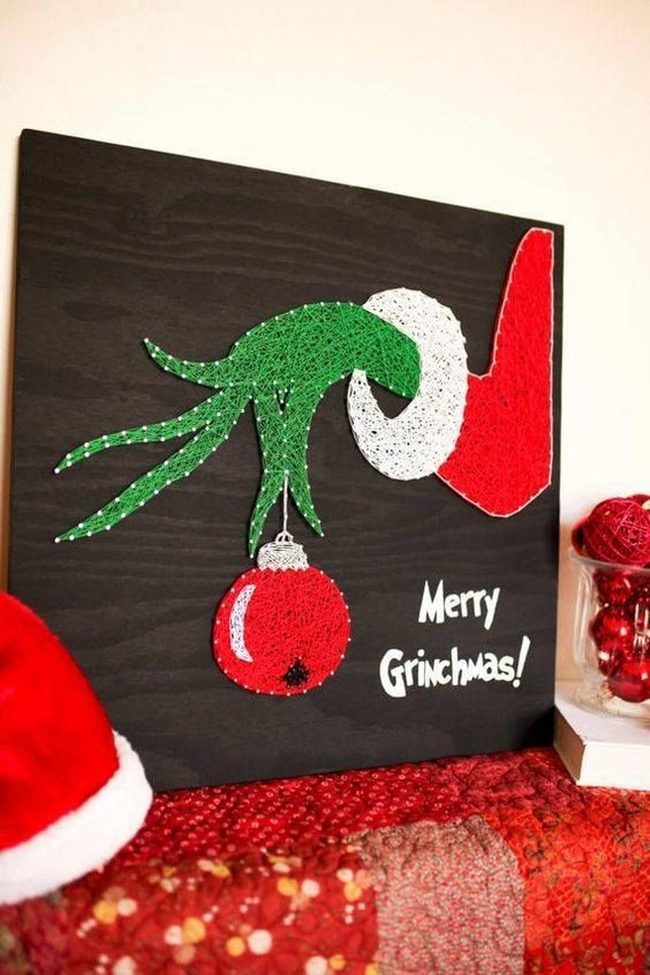 Green Hand Grabs Red Ornament