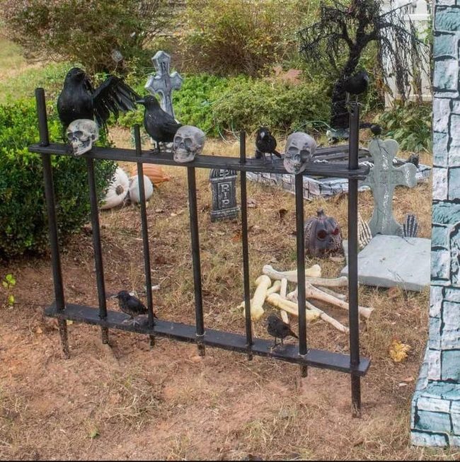 Skeletal Hands Rising From Ground