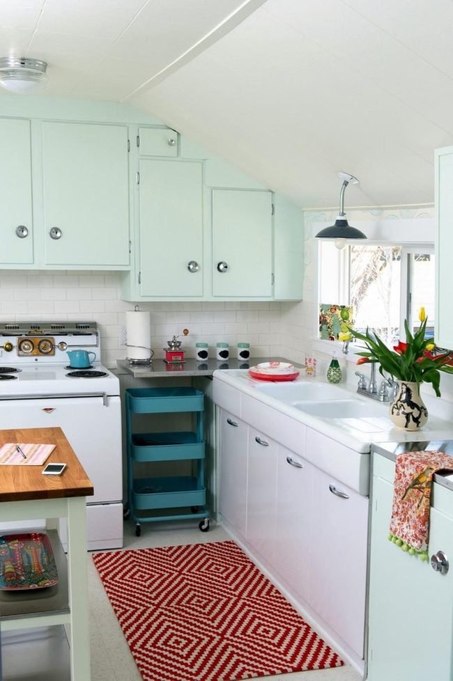 Red Patterned Kitchen With Green Cabinets