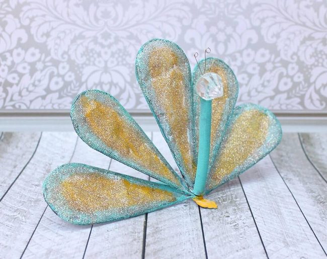 Rusty Whisk Garden Peacock
