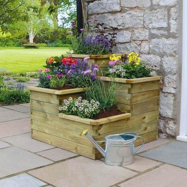 Layered Wood Garden With Cascading Plants