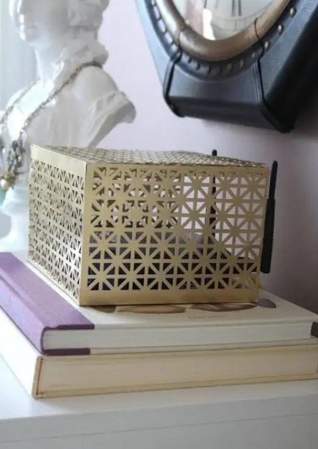 Gold Geometric Shine On Stacked Books