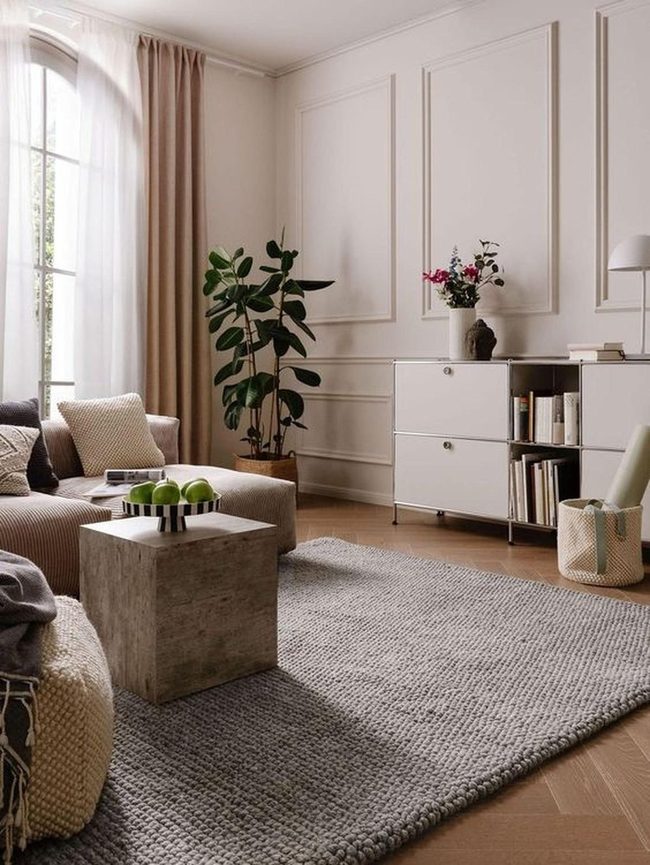 Sunlit Beige Living Room With Green Plants