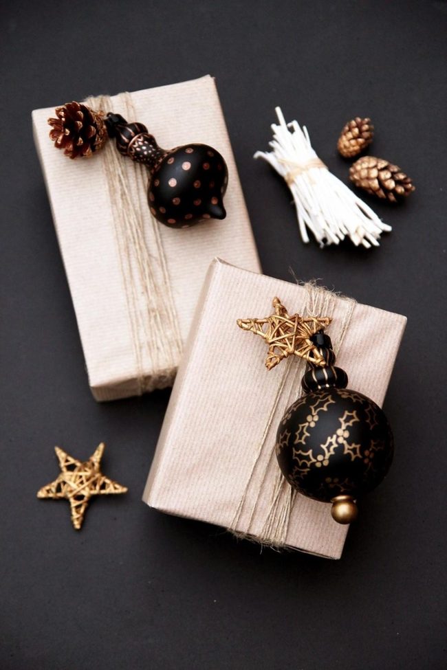 Brown Paper Gifts With Gold Pinecones