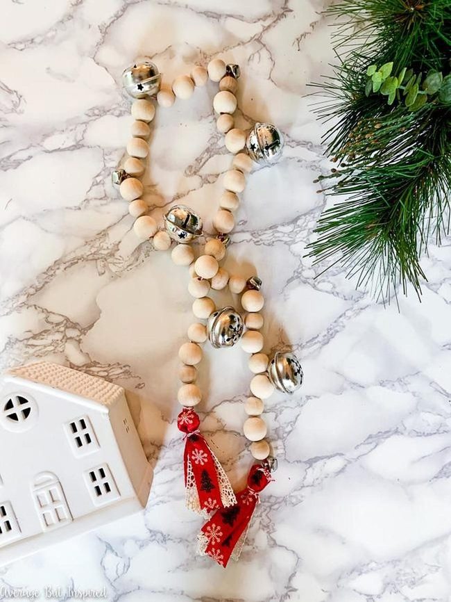 Silver Bells On Wooden Beads
