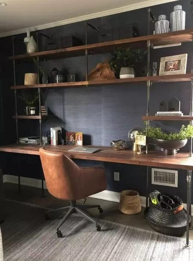 Dark Walls, Wooden Shelves, Brown Leather