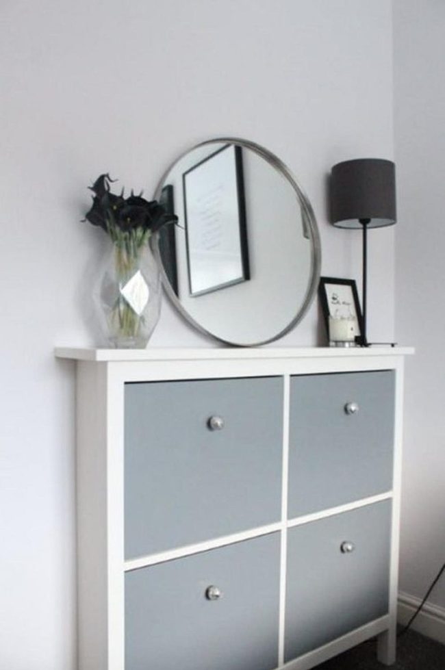 White Cabinetry With Dark Floral Accent