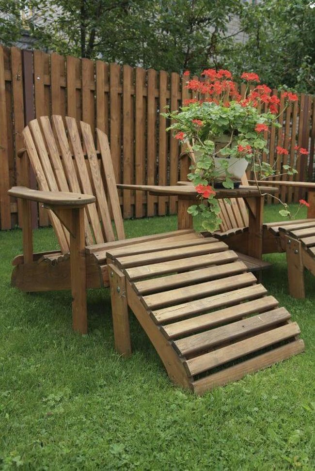Wooden Lounge With Blooming Planters