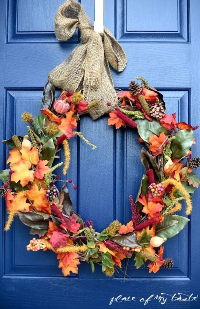 Autumn Leaves Against Blue Door