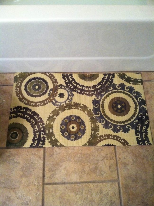 Stone Tile Bathroom With Cream Accents