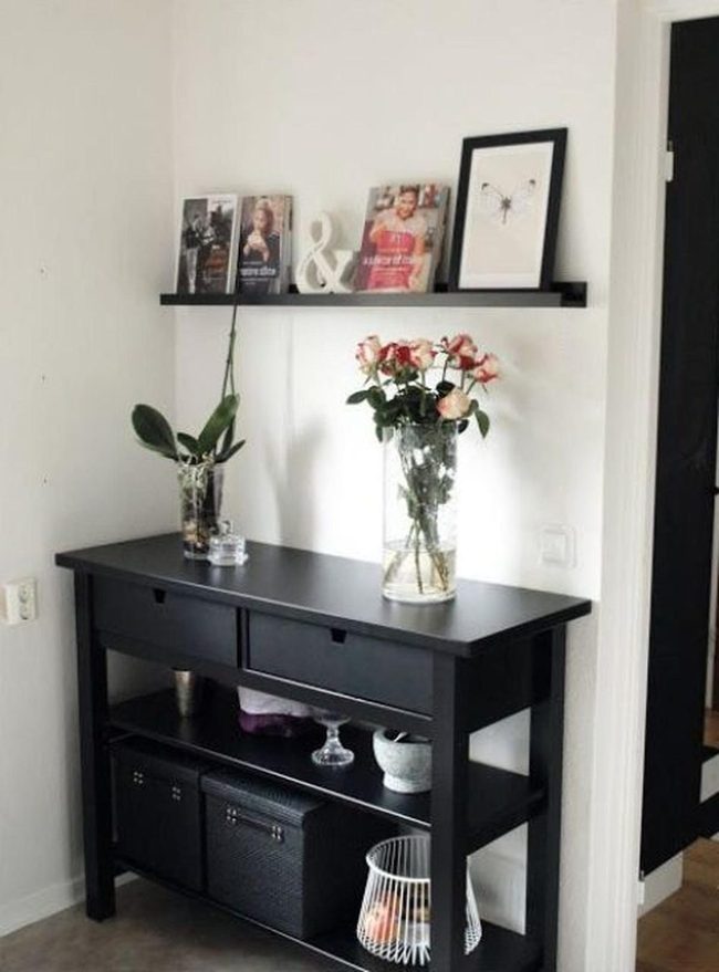Black Console, Pink Roses, White Walls